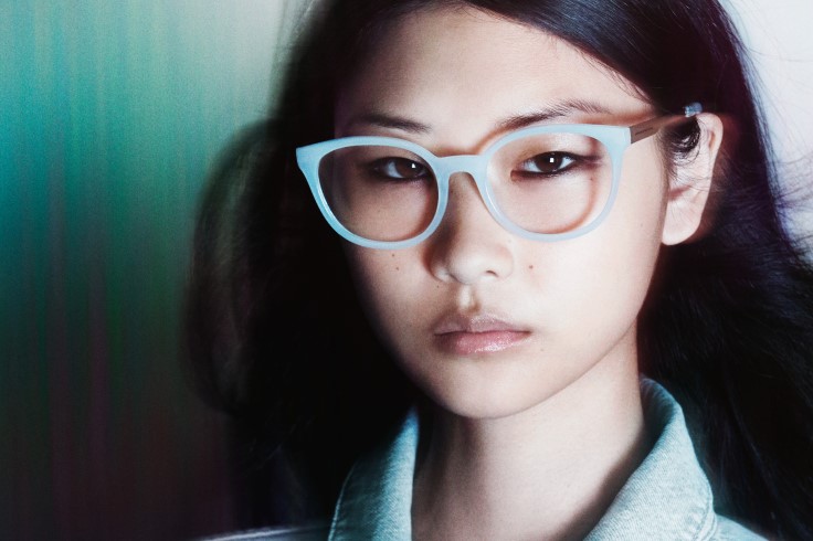 Female Armani Exchange model in eyeglasses