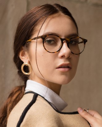 brunette model wearing eyeglasses